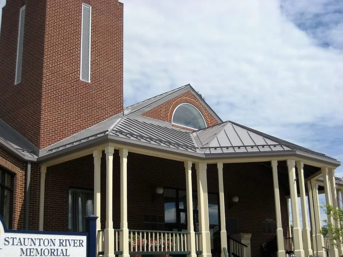 Skilled roofing craftsmen working on a residential roof in Middlesex